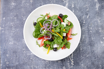 greek salad on the white plate