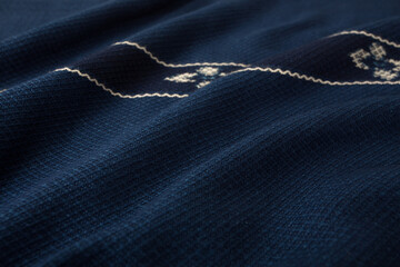 Close up of texture of hand woven shawl, Thai cotton indigo dyed