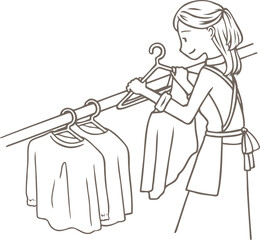 洗濯物を干す女性の線画
