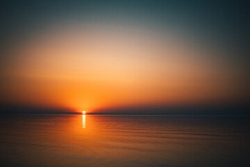 Sunset at Baltic sea stone shore, in Latvia Jurmala Ligo night