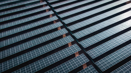 Solar cell panel from aerial view. Photo landscape of a solar farm producing clean energy.