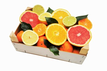 Healthy tropical citrus fruits in a wooden box on white background