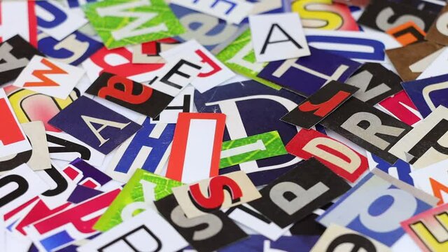 Cut-out color letters spinning around