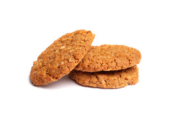 Oat vanilla sugar cookies isolated on white background. Close-up view of brown yellow snacks. Macro shot of beige biscuit cakes for your design