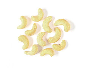 An image flat lay isolated cut out heap cashews or kernel of nut is a food the seed ripe fruit and crunchy by roasting on the white background.