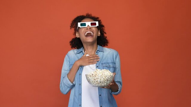 Excited lady hold popcorn plate see comedy isolated brick color background