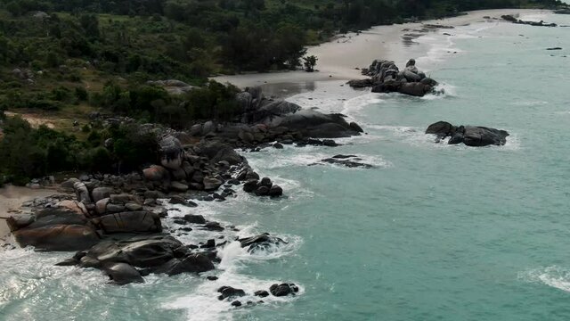 Rambak beach, one of the most beautiful beaches in Bangka Belitung, Indonesia | aerial drone footage videography 4k