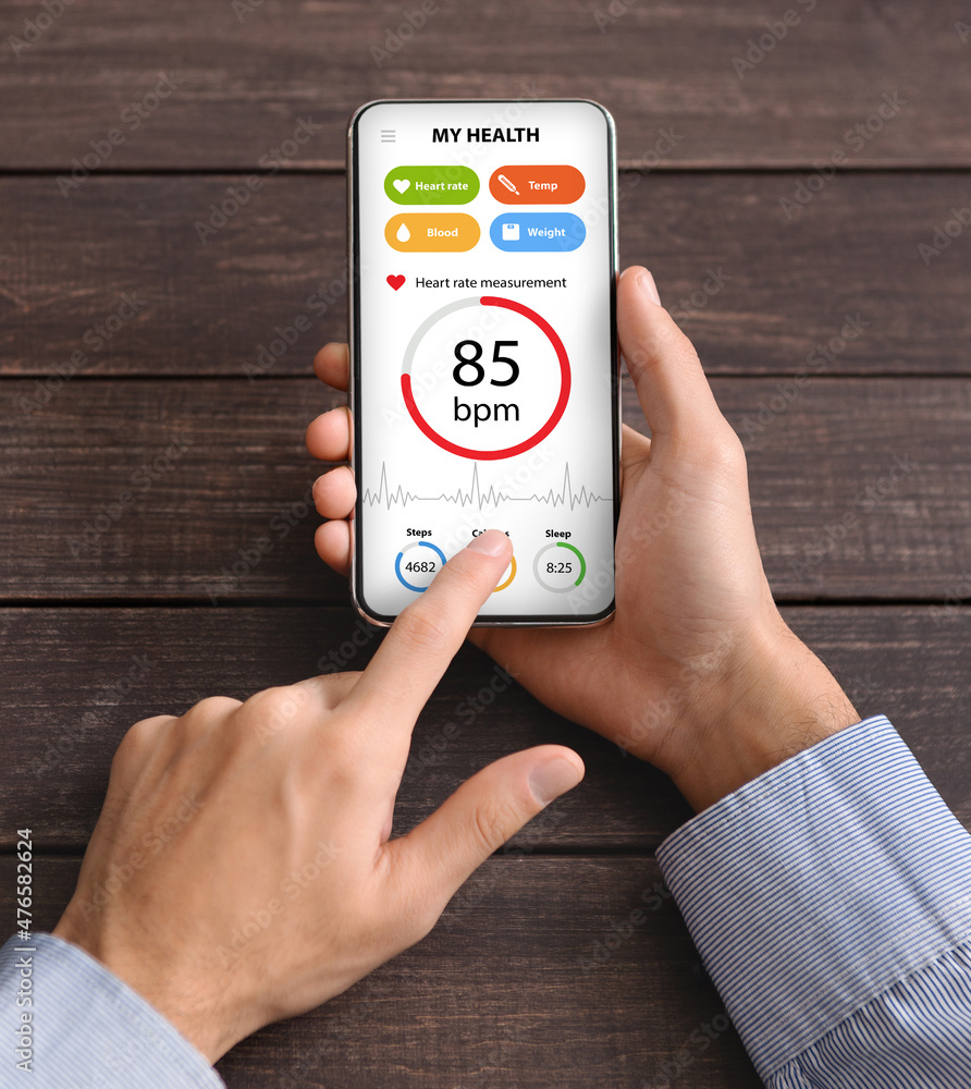 Poster Unrecognizable employee checking heart rate while working