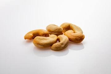Tasty Roasted Cashew nuts isolated on white background