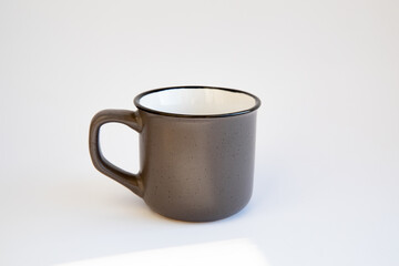 Dark Gray Ceramic Mug with Grainy Texture Isolated on white background Tea Cup Close up Copy space