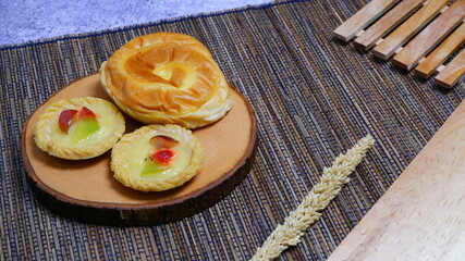 Food Photography, Close up, fruit cake with kitchen utensils neatly arranged and simple which gives an elegant impression, Food and beverages concept. Christmas Concept.