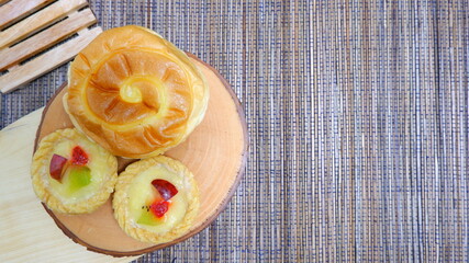 Food Photography, Close up, fruit cake with kitchen utensils neatly arranged and simple which gives an elegant impression, Food and beverages concept. Christmas Concept.