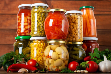 Jars with pickled vegetables and fruity compotes.