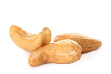 Pile of tasty organic cashew nuts isolated on white
