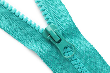 Turquoise zipper on white background, top view