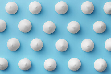 Soft candy pattern on a blue background viewed from above. Top view