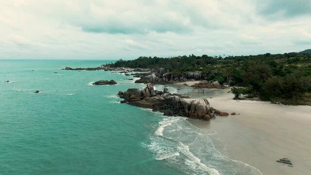 Rambak beach, one of the most beautiful beaches in Bangka Belitung, Indonesia | aerial drone footage videography 4k