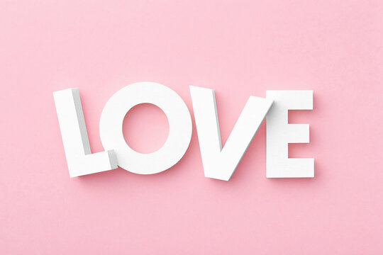 Love Letters Viewed From Above On A Pink Background. Top View