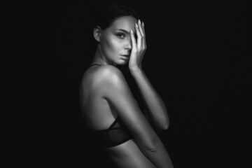 beautiful naked girl in Black studio