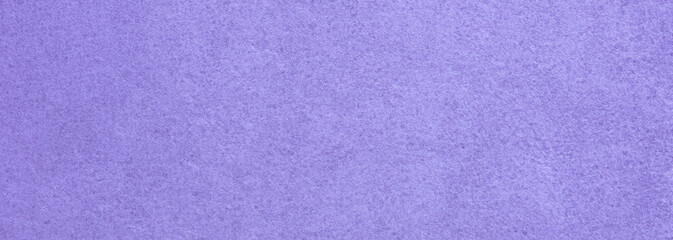Simple background with stone texture in violet, close up, natural copy space ,banner.Toned in color of the year 2022, very peri.