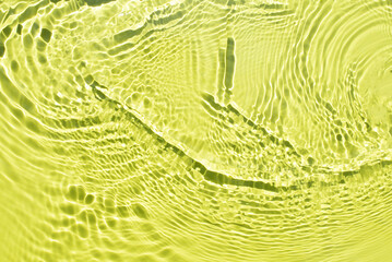 Aqua waves on a light green background. Light and shadows. Water spills on a light yellow background. Natural sunlight and shade. Minimal style.