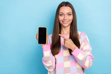 Photo of reliable lady hold phone suggest successful app empty space wear pullover isolated blue color background