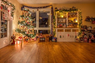 Photo of a living room with Christmas decorations and space for Christmas greetings.