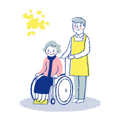 車椅子のシニア女性と男性介護スタッフ