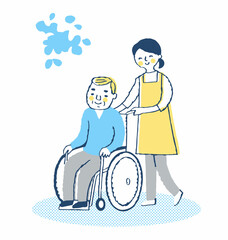 車椅子のシニア男性と女性介護スタッフ