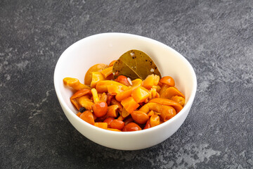 Marinated pickled honey mushrooms in the bowl