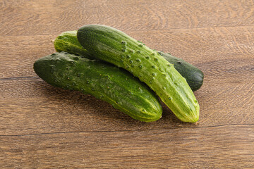 Fersh juicy green cucumbers heap