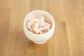 Marinated squid strips in the bowl