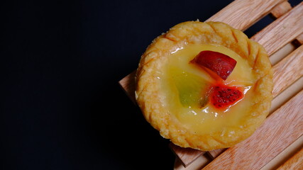 Food Photography, Close up, fruit cake with kitchen utensils neatly arranged and simple which gives an elegant impression, Food and beverages concept. Christmas concept