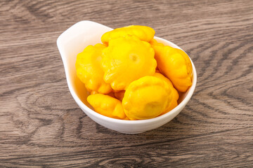 Marinated patissons in the bowl