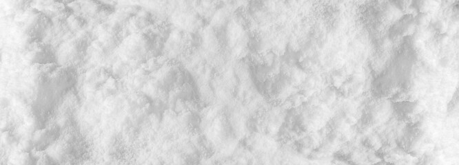 Background of fresh snow winter for design snowy white texture, Closeup top view wide panoramic...