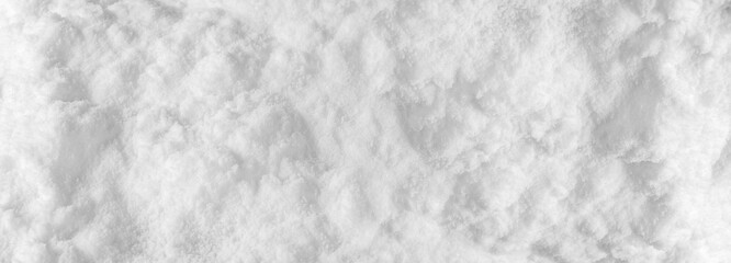 Background of fresh snow winter for design snowy white texture, Closeup top view wide panoramic texture.