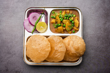 Poori Masala or potato curry with fried puri