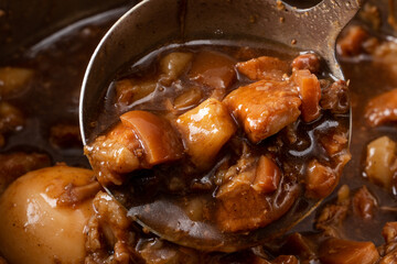 Cooking braised pork for eating with rice. Taiwanese traditional food.