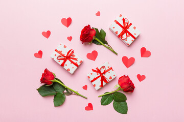 Kraft Gift box with beautiful red ribbon and rose, concept of Valentine day, anniversary, mother day and birthday greeting, copy space, top view