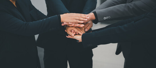 Close-up of stack hand of Businessman handshake for teamwork of business merger partnership and...