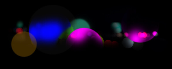 Vibrant saturated colorful light globes floating in the dark space. Pink, blue, green, yellow, and red spheres for futuristic website banner with space for text and design.