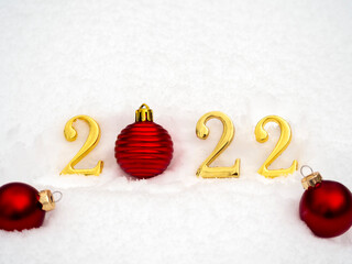 Figures 2022 in the Snow. New Year's Eve Concept.