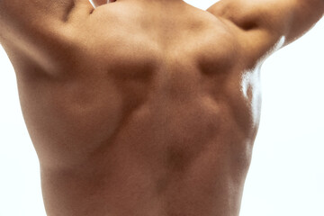 Back. Detailed texture of human skin. Close up shot of young muscled male body. Skincare, bodycare, healthcare
