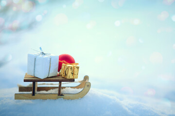 Christmas background with snow and wood sled stand in white snow.
