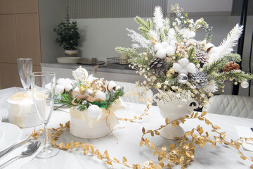 Christmas table with eating utensils. New Year's Eve dinner.