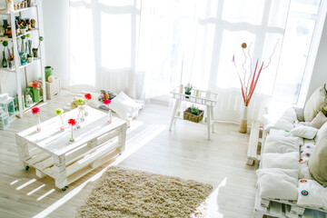 White pallet interior at home in sun light 