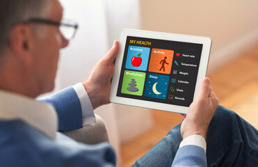 Unrecognizable Elderly Man Using Tablet Sitting At Home, Panorama