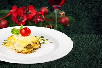 Christmas Fresh tasty hot lasagna. Traditional italian food.