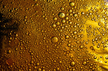 Abstract background with bright circles. Colorful image, drops of oil on the water.
 Liquid abstraction. 