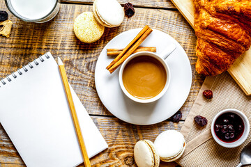 breakfast at home on wooden table with cup of coffee